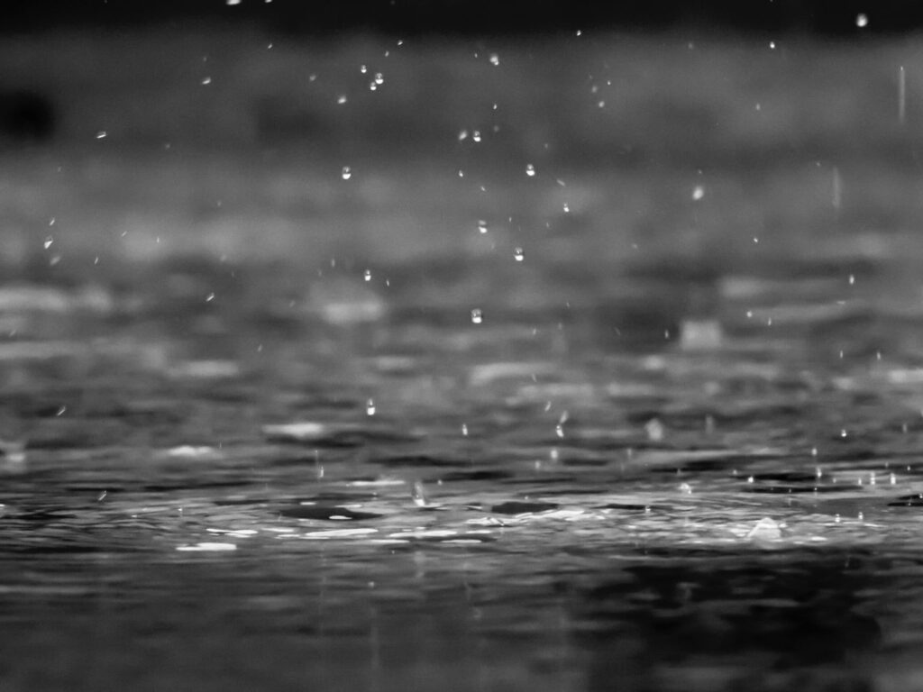 rain falls into a puddle | plumbing colorado springs