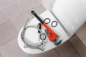 Plumber's tools on toilet at colorado springs home | colorado springs plumber