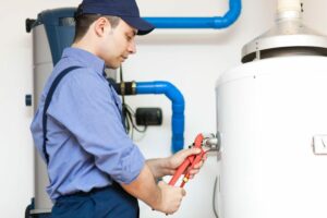 technician replacing boiler in Colorado Springs