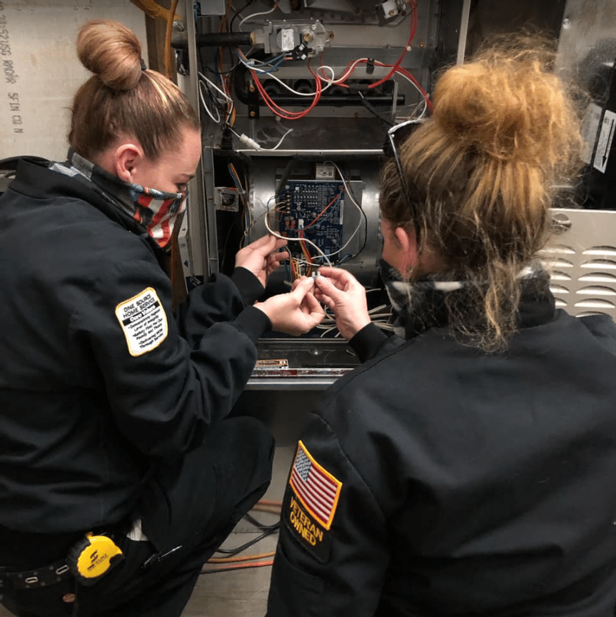 techs performing ac repairs colorado springs co